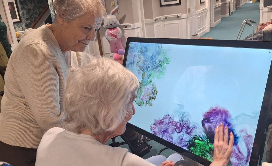 Care home dementia community using an interactive table for dementia.